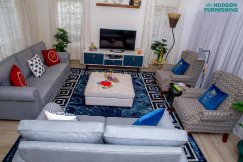 A carpet displayed in a living room setup.